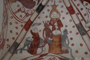 Devils temping a woman churning butter, 13th century mural painting, Västra Vemmerlöv.jpg