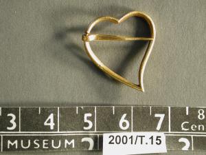 A 14th century, asymmetric heart brooch.jpg