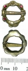 A copper alloy gilt annular brooch from the medieval period..jpg