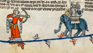 Woman armed with crossbow draws a bead on knights in an elephant castle. One of the knights seems to be shrugging. Smithfield decretals. 1300-1340_1.jpg